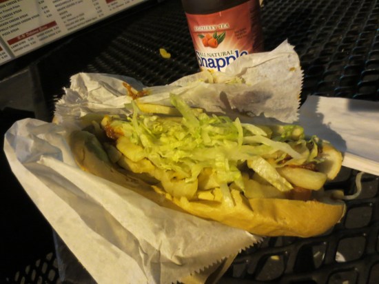 Falafel, fries, mozzarella sticks, lettuce, tomatoes, and a heart attack on a roll