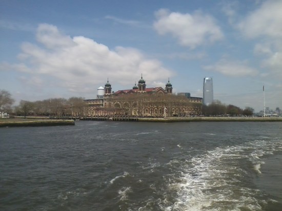sailing away from Ellis Island