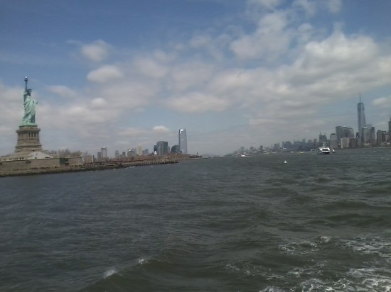 the statue looking at Manhattan